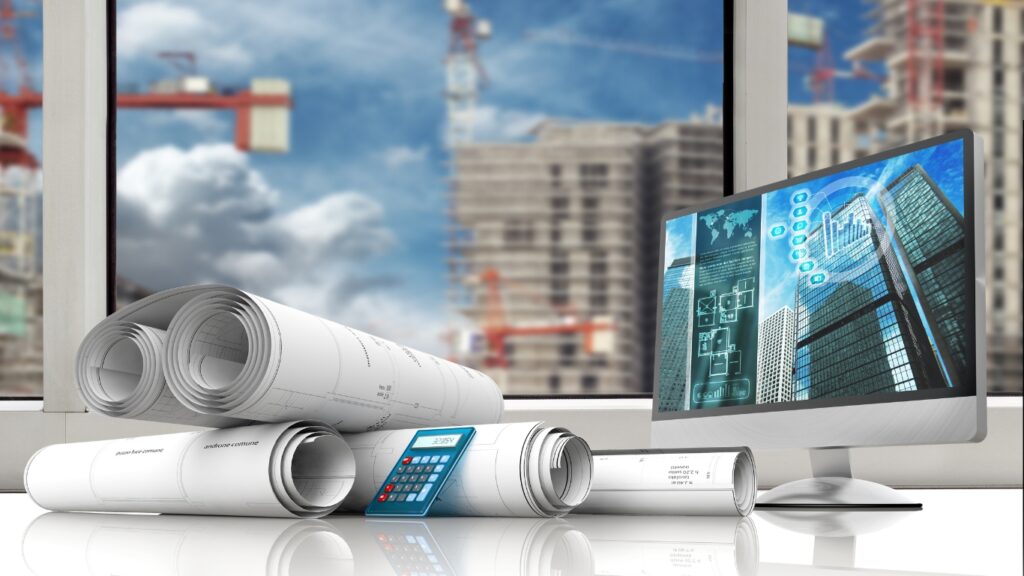 建設プロジェクト　パソコンと図面