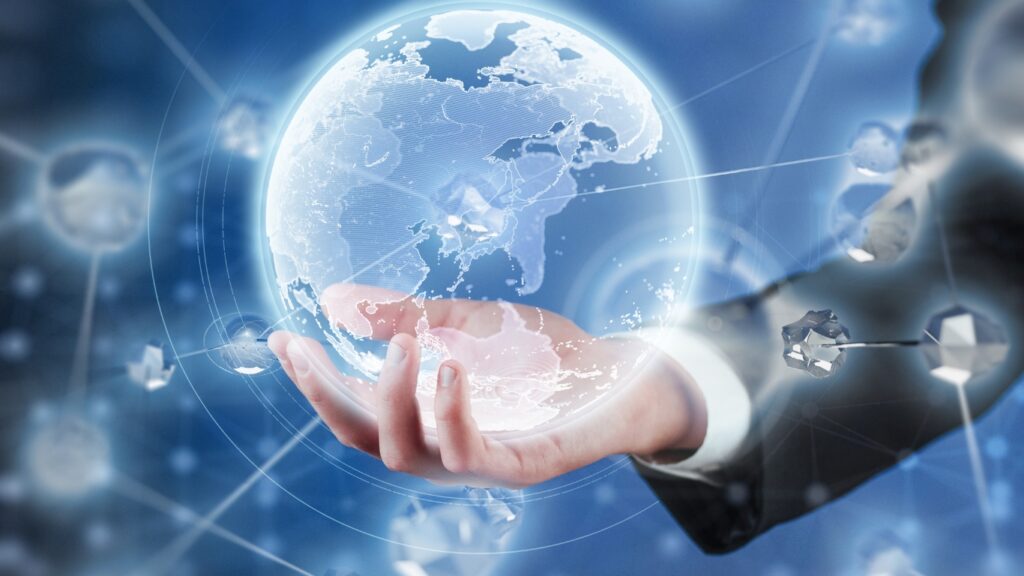 地球儀を持つビジネスパーソンの手
