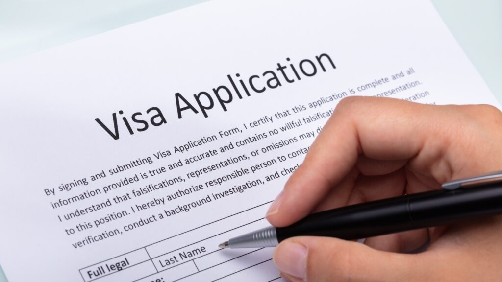 Woman Filling Visa Application Form