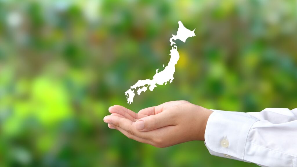 日本地図と人の手